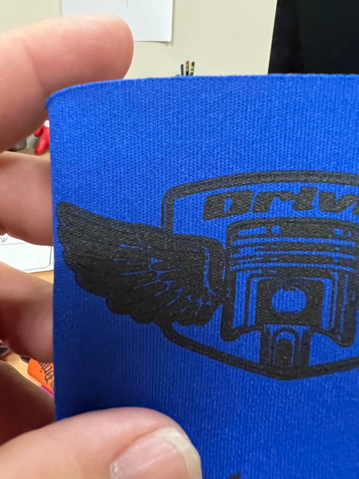 wing logo koozie